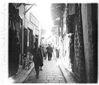 1933 06 12 Tunisie Tunis rue de l'église de marchands de tapis